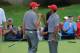 DUBLIN, OH - OCTOBER 04: Matt Kuchar and Tiger Woods of the U.S. Team celebrate after a birdie on the fourth green to halve the hole during the Day Two Foursome Matches at the Muirfield Village Golf Club on October 4, 2013 in Dublin, Ohio. (Photo by Da