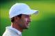 Oct 3, 2013; Dublin, OH, USA; Adam Scott on the 18th green during the Thursday four ball matches of the Presidents Cup at Muirfield Village Golf Club. Mandatory Credit: Allan Henry-USA TODAY Sports