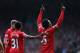 LIVERPOOL, ENGLAND - OCTOBER 05: Daniel Sturridge of Liverpool celebrates with Raheem Sterling after scoring the second goal during the Barclays Premier League match between Liverpool and Crystal Palace at Anfield on October 5, 2013 in Liverpool, England