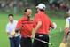 DUBLIN, OH - OCTOBER 05: Tiger Woods and Matt Kuchar of the U.S. Team celebrate on the 18th green after defeating the team of Scott/ Matsuyama 1up during the Day Three Four-ball Matches at the Muirfield Village Golf Club on October 5, 2013 in Dublin, Oh