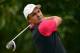 PARIS, FRANCE - OCTOBER 03: Simon Khan of Great Britain and Ireland team plays a shot during the first day's fourballs at the Seve Trophy at Golf de Saint-Nom-la-Breteche on October 3, 2013 in Paris, France. (Photo by Stuart Franklin/Getty Images)