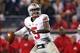 Oct 5, 2013; Evanston, IL, USA; Ohio State Buckeyes quarterback Braxton Miller (5) throws a pass against the Northwestern Wildcats during the fourth quarter at Ryan Field. Ohio State won 40-30. Mandatory Credit: Jerry Lai-USA TODAY Sports
