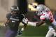 Oct 5, 2013; Evanston, IL, USA; Northwestern Wildcats running back Venric Mark (5) runs against Ohio State Buckeyes defensive back Tyvis Powell (23) during the second quarter at Ryan Field. Mandatory Credit: Jerry Lai-USA TODAY Sports