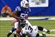 Oct 6, 2013; Indianapolis, IN, USA; Indianapolis Colts inside linebacker Jerrell Freeman (50) sacks Seattle Seahawks quarterback Russell Wilson (3) during the first half at Lucas Oil Stadium. Mandatory Credit: Pat Lovell-USA TODAY Sports