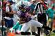 MIAMI GARDENS, FL - OCTOBER 06: Receiver Tandon Doss #17 of the Baltimore Ravens makes a catch against defensive back Reshad Jones #20 ofthe Miami Dolphins at Sun Life Stadium on October 6, 2013 in Miami Gardens, Florida. The Ravens defeated the Dolphins