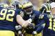 Oct 5, 2013; Ann Arbor, MI, USA; Michigan Wolverines linebacker James Ross III (15) receives congratulations from defensive end Keith Heitzman (92) and defensive back Blake Countess (18) after he recovers a fumble in the first quarter against the Minneso