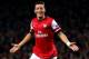 LONDON, ENGLAND - OCTOBER 01: Mesut Oezil of Arsenal celebrates after scoring the opening goal during UEFA Champions League Group F match between Arsenal FC and SSC Napoli at Emirates Stadium on October 1, 2013 in London, England. (Photo by Paul Gilham/