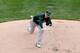DETROIT, MI - OCTOBER 07: Jarrod Parker #11 of the Oakland Athletics pitches against the Detroit Tigers during Game Three of the American League Division Series at Comerica Park on October 7, 2013 in Detroit, Michigan. (Photo by Leon Halip/Getty Images)