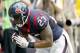 HOUSTON, TX- SEPTEMBER 29: Arian Foster #23 of the Houston Texans bows after his rushing touchdown against the Seattle Seahawks on September 29, 2013 at Reliant Stadium in Houston, Texas. (Photo by Thomas B. Shea/Getty Images)