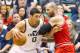 Feb 8, 2013; Salt Lake City, UT, USA; Utah Jazz center Enes Kanter (0) is defended by Chicago Bulls power forward Carlos Boozer (5) during the first half at EnergySolutions Arena. Mandatory Credit: Russ Isabella-USA TODAY Sports
