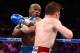 LAS VEGAS, NV - SEPTEMBER 14: (L-R) Floyd Mayweather Jr. throws a left at Canelo Alvarez during their WBC/WBA 154-pound title fight at the MGM Grand Garden Arena on September 14, 2013 in Las Vegas, Nevada. (Photo by Al Bello/Getty Images)