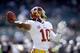OAKLAND, CA - SEPTEMBER 29: Robert Griffin III #10 of the Washington Redskins warms up before their game against the Oakland Raiders at O.co Coliseum on September 29, 2013 in Oakland, California. (Photo by Ezra Shaw/Getty Images)