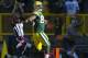 James Jones glides into the end zone for one of his two touchdowns against Detroit on Oct. 6.