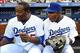 Uribe (left) joking with Yasiel Puig.