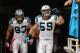 GLENDALE, AZ - OCTOBER 06: Middle linebacker Luke Kuechly #59 of the Carolina Panthers leads outside linebacker Chase Blackburn #93 out onto the field before the NFL game against the Arizona Cardinals at the University of Phoenix Stadium on October 6, 20