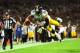 LONDON, ENGLAND - SEPTEMBER 29: Running back Le'Veon Bell #26 of the Pittsburgh Steelers dives into the endzone turnover score a touchdown during the NFL International Series game between Pittsburgh Steelers and Minnesota Vikings at Wembley Stadium on Se