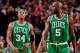 PORTLAND, OR - FEBRUARY 24: Paul Pierce #34 and Kevin Garnett #5 of the Boston Celtics wait to resume action against the Portland Trail Blazers on February 24, 2013 at the Rose Garden Arena in Portland, Oregon. NOTE TO USER: User expressly acknowledges an