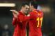 CARDIFF, WALES - OCTOBER 12: Aaron Ramsey of Wales celebrates with 2 goal hero Gareth Bale at the end of the FIFA 2014 World Cup Group A Qualifier between Wales and Scotland at City of Cardiff Stadium on October 12, 2012 in Cardiff, Wales. (Photo by Mik