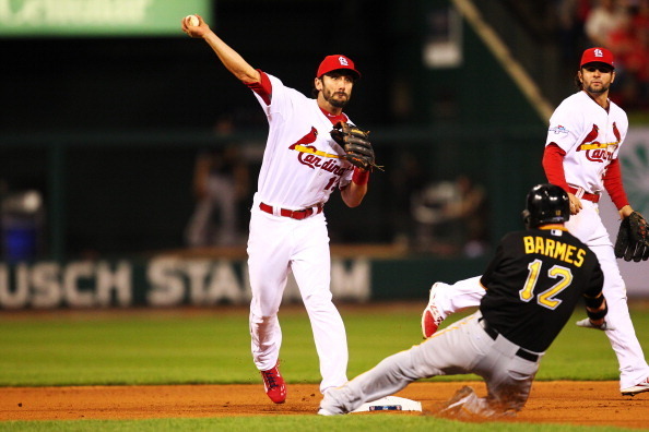 Carpenter, Holliday send Cardinals to win over Pirates in 12 innings