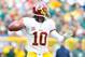 Sep 15, 2013; Green Bay, WI, USA; Washington Redskins quarterback Robert Griffin III (10) throws a pass during the first quarter against the Green Bay Packers at Lambeau Field. Mandatory Credit: Jeff Hanisch-USA TODAY Sports