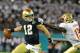ORLANDO, FL - DECEMBER 29: Quarterback Andrew Hendrix #12 of the Notre Dame Fight Irish runs from the pocket against the Florida State Seminoles in the Champs Sports Bowl December 29, 2011 at the Florida Citrus Bowl in Orlando, Florida. FSU won 18 - 14.