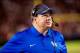Oct 5, 2013; Columbia, SC, USA; Kentucky Wildcats head coach Mark Stoops checks the time on the scoreboard against the South Carolina Gamecocks in the second quarter at Williams-Brice Stadium. Mandatory Credit: Jeff Blake-USA TODAY Sports