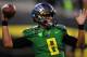 EUGENE, OR - SEPTEMBER 28: Quarterback Marcus Mariota #8 of the Oregon Ducks warms up before the game against the California Golden Bears at Autzen Stadium on September 28, 2013 in Eugene, Oregon. (Photo by Steve Dykes/Getty Images)