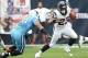 Sep 15, 2013; Houston, TX, USA; Houston Texans running back Arian Foster (23) runs with the ball against Tennessee Titans defensive end Derrick Morgan (91) at Reliant Stadium. Mandatory Credit: Matthew Emmons-USA TODAY Sports