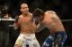 May 26, 2012; Las Vegas, NV, USA; Junior Dos Santos (left) connects with a punch on Frank Mir (right) during the UFC 146 at the MGM Grand Garden event center. Mandatory Credit: Ron Chenoy-USA TODAY Sports