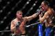 Dec 29, 2012; Las Vegas, NV, USA; Cain Velasquez (left) strikes Junior Dos Santos (right) during UFC 155 at the MGM Grand Garden Arena. Mandatory Credit: Gary A. Vasquez-USA TODAY Sports