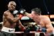 CARSON, CA - MARCH 16: Ruslan Provodnikov, of Russia, (R) lands a punch into the head of WBO welterweight champion Timothy Bradley during the third ninth of the WBO welterweight title boxing match at The Home Depot Center on March 16, 2013 in Carson, Ca