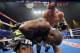 LAS VEGAS, NV - OCTOBER 12: Juan Manuel Marquez (R) lands a punch to the head of WBO welterweight champion Timothy Bradley Jr. during their bout at the Thomas & Mack Center on October 12, 2013 in Las Vegas, Nevada. Timothy Bradley Jr. wins in a split-dec