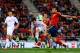 PALMA DE MALLORCA, SPAIN - OCTOBER 11: Michu of Spain (R) shoots towards goal under a challenge by Balanovich of Belarus during the FIFA 2014 World Cup Qualifier match between Spain and Belarus at Iberostars Stadium on October 11, 2013 in Palma de Mallor