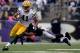 BALTIMORE, MD - OCTOBER 13: Jarrett Boykin #11 of the Green Bay Packers avoids the tackle of Jimmy Smith #22 of the Baltimore Ravens in the third quarter during a game at M&T Bank Stadium on October 13, 2013 in Baltimore, Maryland. (Photo by Patrick McDer
