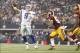 Oct 13, 2013; Arlington, TX, USA; Dallas Cowboys quarterback Tony Romo (9) throws a touchdown pass while being rushed by Washington Redskins inside linebacker Perry Riley (56) in the third quarter of the game at AT&T Stadium. The Dallas Cowboys beat the