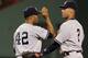 BOSTON, MA - AUGUST 05: Mariano Rivera #42 and Derek Jeter #3 of the New York Yankees celebrate the win over the Boston Red Sox on August 5, 2011 at Fenway Park in Boston, Massachusetts. The New York Yankees defeated the Boston Red Sox 3-2. (Photo by El