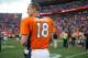 DENVER, CO - SEPTEMBER 29: Quarterback Peyton Manning #18 of the Denver Broncos walks off of the field after the win over the Philadelphia Eagles at Sports Authority Field Field at Mile High on September 29, 2013 in Denver, Colorado. (Photo by Dustin Br