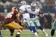 Oct 13, 2013; Arlington, TX, USA; Dallas Cowboys running back Joseph Randle (21) runs with the ball against Washington Redskins cornerback Josh Wilson (26) in the third quarter at AT&T Stadium. The Dallas Cowboys beat the Washington Redskins 31-16. Mandat