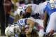 SAN DIEGO, CA - OCTOBER 14: Quarterback Andrew Luck #12 of the Indianapolis Colts is sacked in the fourth quarter against San Diego Chargers at Qualcomm Stadium October 14, 2013 in San Diego, California. (Photo by Kevork Djansezian/Getty Images)