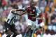 BIRMINGHAM, ENGLAND - SEPTEMBER 14: Christian Benteke of Aston Villa tangles with Mapou Yanga-Mbiwa of Newcastle United during the Barclays Premier League match between Aston Villa and Newcastle United at Villa Park on September 14, 2013 in Birmingham, E