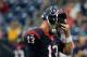 HOUSTON, TX - OCTOBER 13: T.J. Yates #13 of the Houston Texans reacts after a play in the second half against the St. Louis Rams at Reliant Stadium on October 13, 2013 in Houston, Texas. (Photo by Scott Halleran/Getty Images)