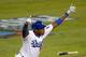 LOS ANGELES, CA - OCTOBER 14: Yasiel Puig #66 of the Los Angeles Dodgers reacts as he hits a RBI triple in the fourth inning against the St. Louis Cardinals in Game Three of the National League Championship Series at Dodger Stadium on October 14, 2013 in