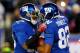 EAST RUTHERFORD, NJ - NOVEMBER 25: Wide receiver Rueben Randle #82 of the New York Giants celebrates with teammate wide receiver Hakeem Nicks #88 of the New York Giants after scoring a touchdown in the first quarter against the Green Bay Packers at MetLi