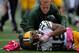 BALTIMORE, MD - OCTOBER 13: Randall Cobb #18 of the Green Bay Packers is attended to by a trainer after being injuired on a play in the second quarter during a game against the Baltimore Ravens at M&T Bank Stadium on October 13, 2013 in Baltimore, Maryla