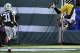 Oct 13, 2013; East Rutherford, NJ, USA; Pittsburgh Steelers wide receiver Emmanuel Sanders (88) does a flip as he scores a touchdown after making a catch against the New York Jets during the second half at MetLife Stadium. The Steelers won the game 19-6.