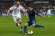 PARIS, FRANCE - OCTOBER 15: Franck Ribery of France crosses the ball ahead of Petri Pasanen of Finland during the FIFA 2014 World Cup Qualifying Group I match between France and Finland at the Stade de France on October 15, 2013 in Paris, France. (Photo