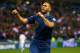PARIS, FRANCE - OCTOBER 15: Karim Benzema of France celebrates scoring his teams third goal during the FIFA 2014 World Cup Qualifying Group I match between France and Finland at the Stade de France on October 15, 2013 in Paris, France. (Photo by Julian