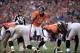 Oct 13, 2013; Denver, CO, USA; Denver Broncos quarterback Peyton Manning (18) calls out in fourth quarter against the Jacksonville Jaguars at Sports Authority Field at Mile High. The Broncos defeated the Jaguars 35-19. Mandatory Credit: Ron Chenoy-USA TO
