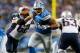 DETROIT, MI - AUGUST 22: Ndamukong Suh #90 of the Detroit Lions tries to get through the blocks of Ryan Wendell #62 and Dan Connolly #63 of the New England Patriots during the first quarter during a pre season game at Ford Field on August 22, 2013 in Detr