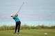 SOUTHAMPTON, BERMUDA - OCTOBER 15: Justin Rose of England tees off on the pat four 9th hole during the first round of the PGA Grand Slam of Golf at Port Royal Golf Course on October 15, 2013 in Southampton, Bermuda. (Photo by Ross Kinnaird/Getty Images)